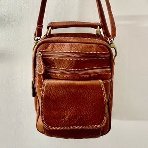 100% leather Crossbody purse. Purchased in Italy.